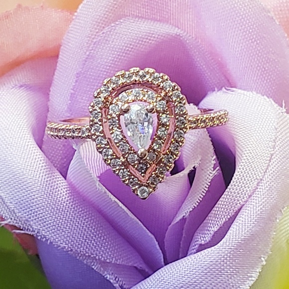 Jewelry - White Topaz on a Rose Gold Plated Band Ring Size 8